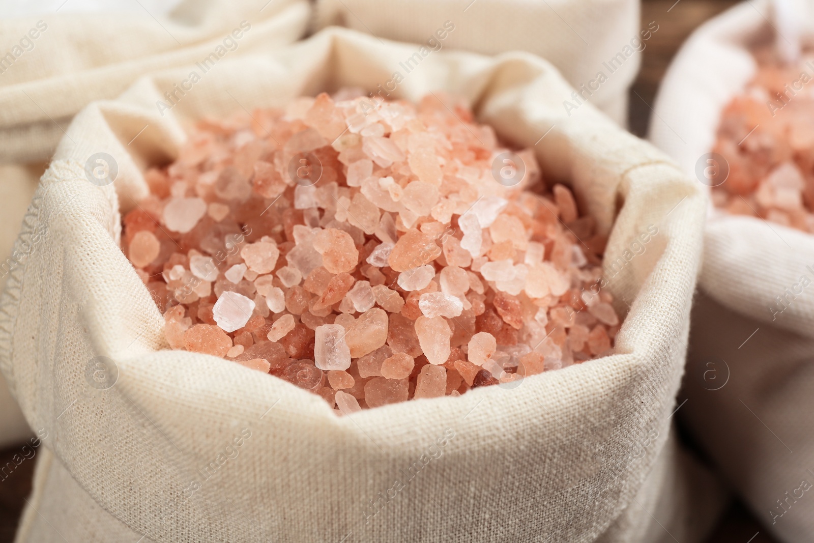 Photo of White sack of pink himalayan salt, closeup