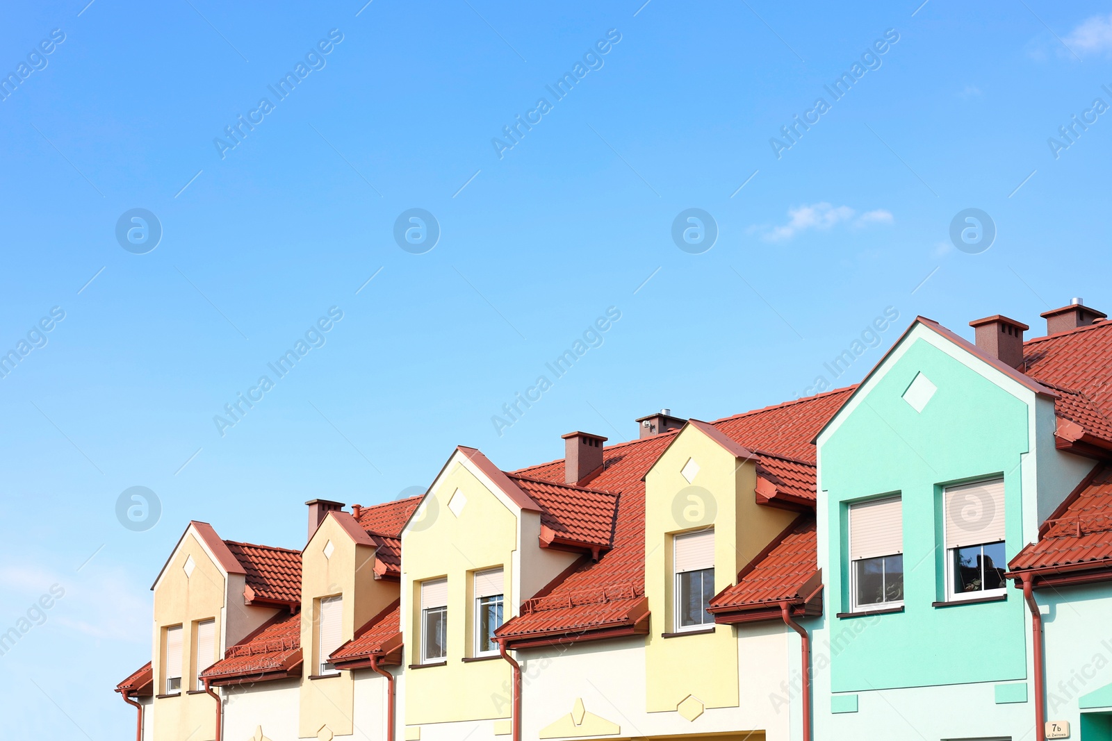 Photo of Block of houses outdoors on sunny day