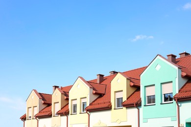 Photo of Block of houses outdoors on sunny day