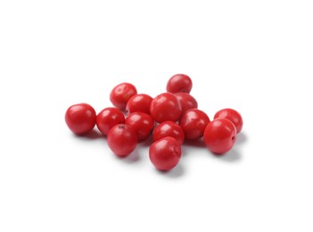 Aromatic spice. Many red peppercorns isolated on white