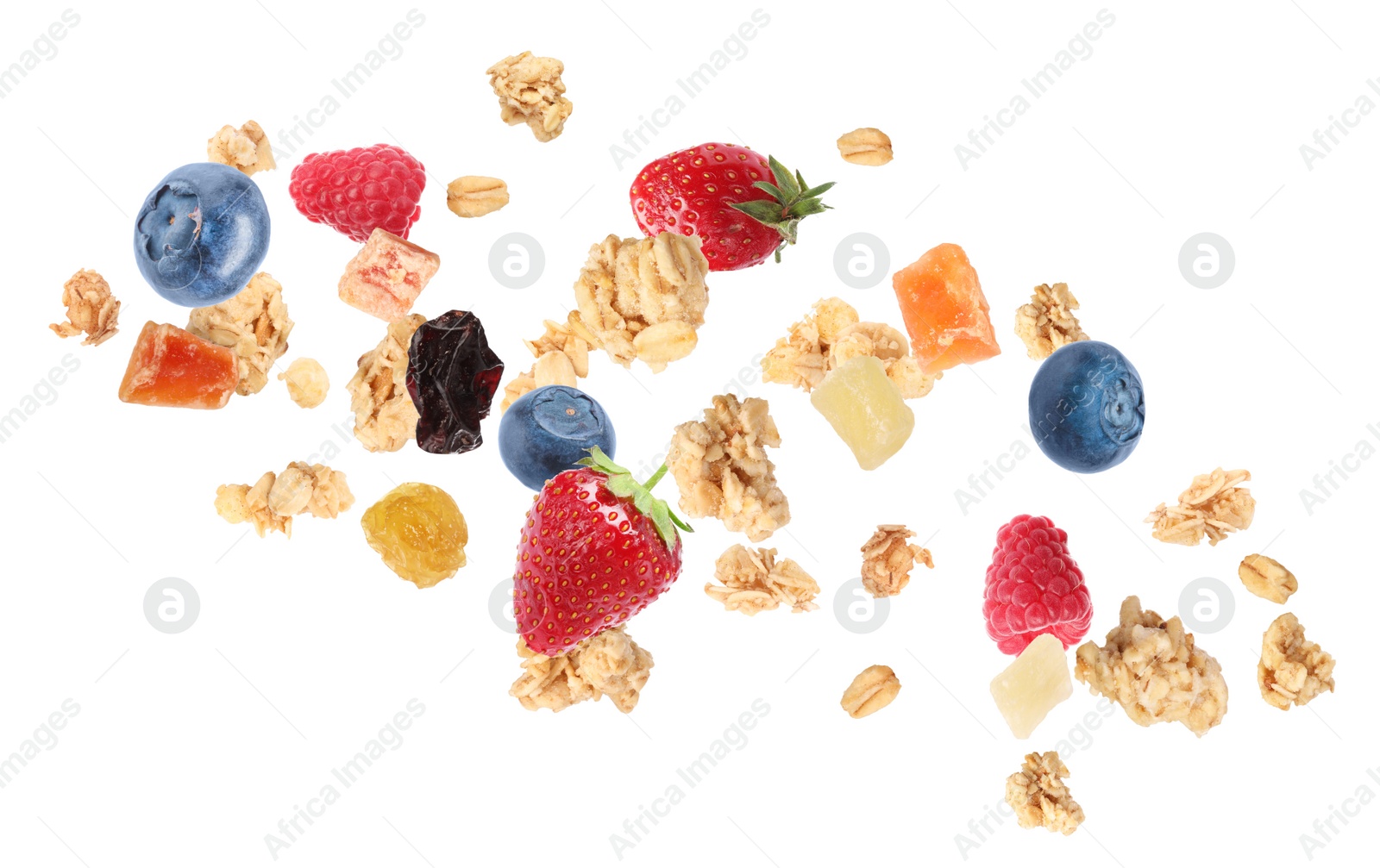 Image of Delicious granola, berries and dried fruits falling on white background. Healthy snack  