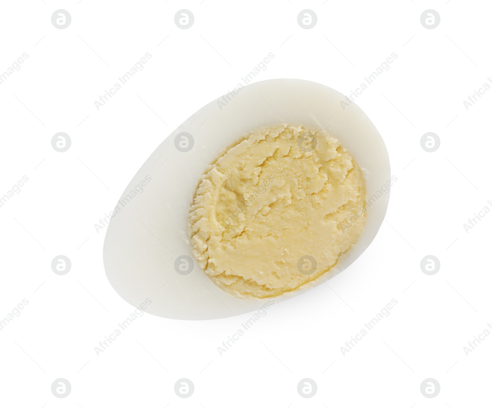 Photo of Half of peeled hard boiled quail egg on white background, top view