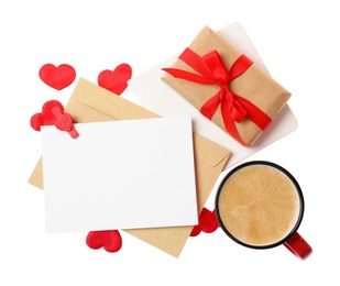 Photo of Blank card, gift box and cup of coffee on white background, top view. Valentine's Day celebration