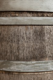 Photo of Traditional wooden barrel as background, closeup. Wine making