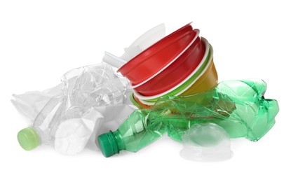 Pile of different plastic items on white background