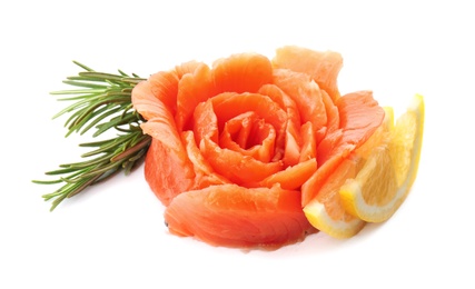 Photo of Flower made of fresh sliced salmon fillet on white background