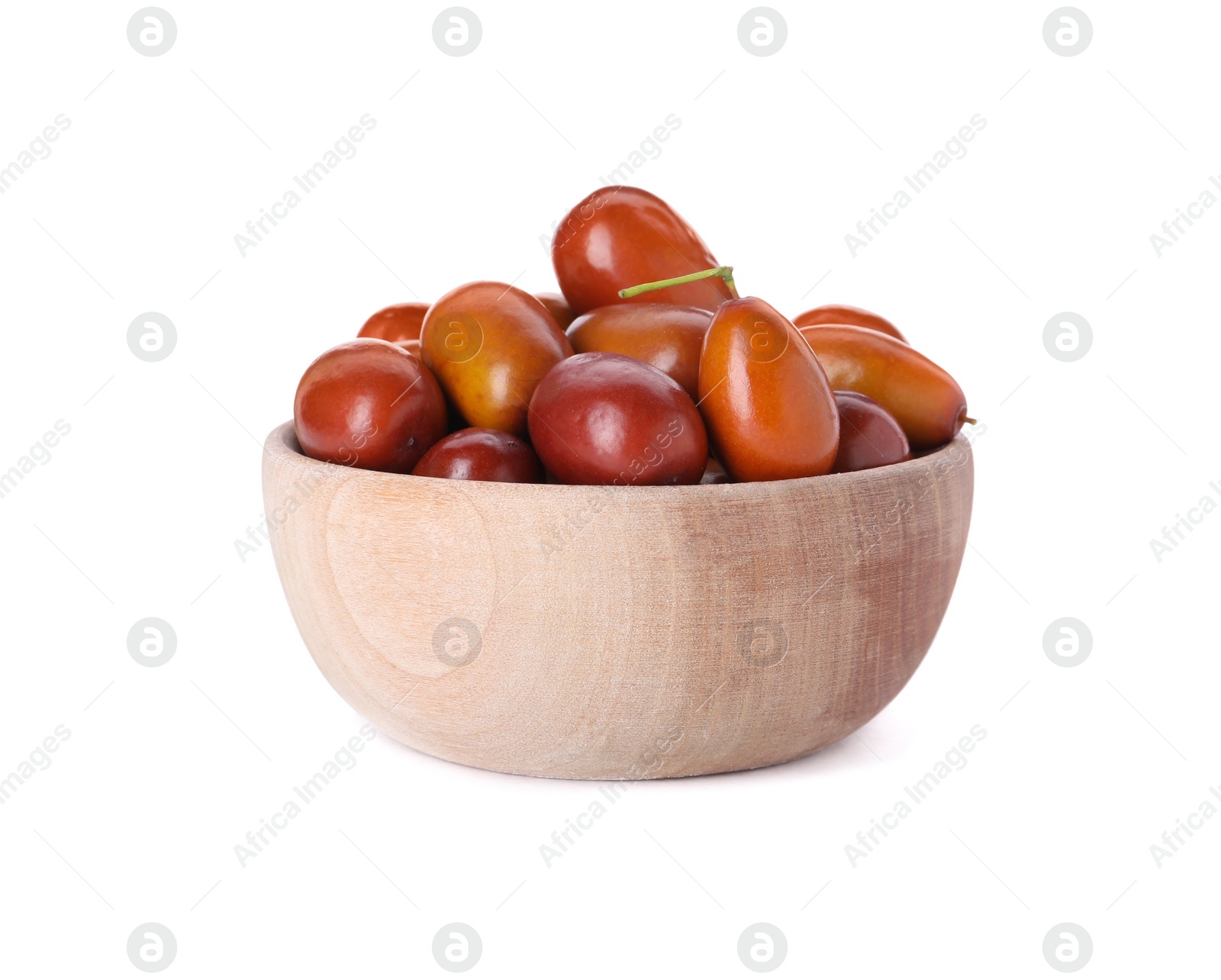 Photo of Ripe red dates in wooden bowl on white background