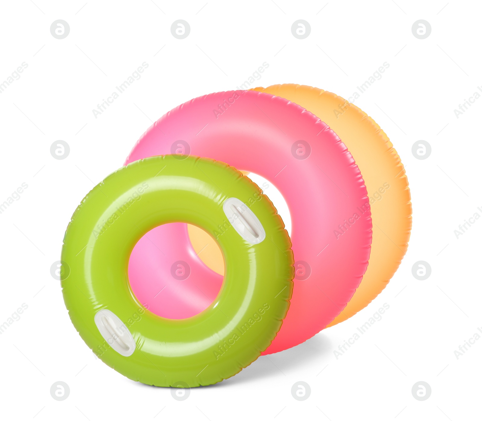 Photo of Different inflatable rings on white background. Summer holidays