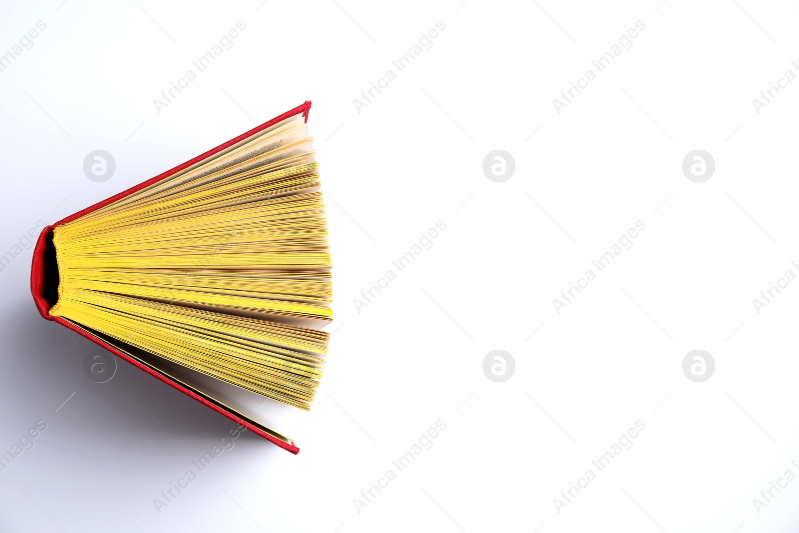 Photo of Hardcover book on white background, top view. Space for text