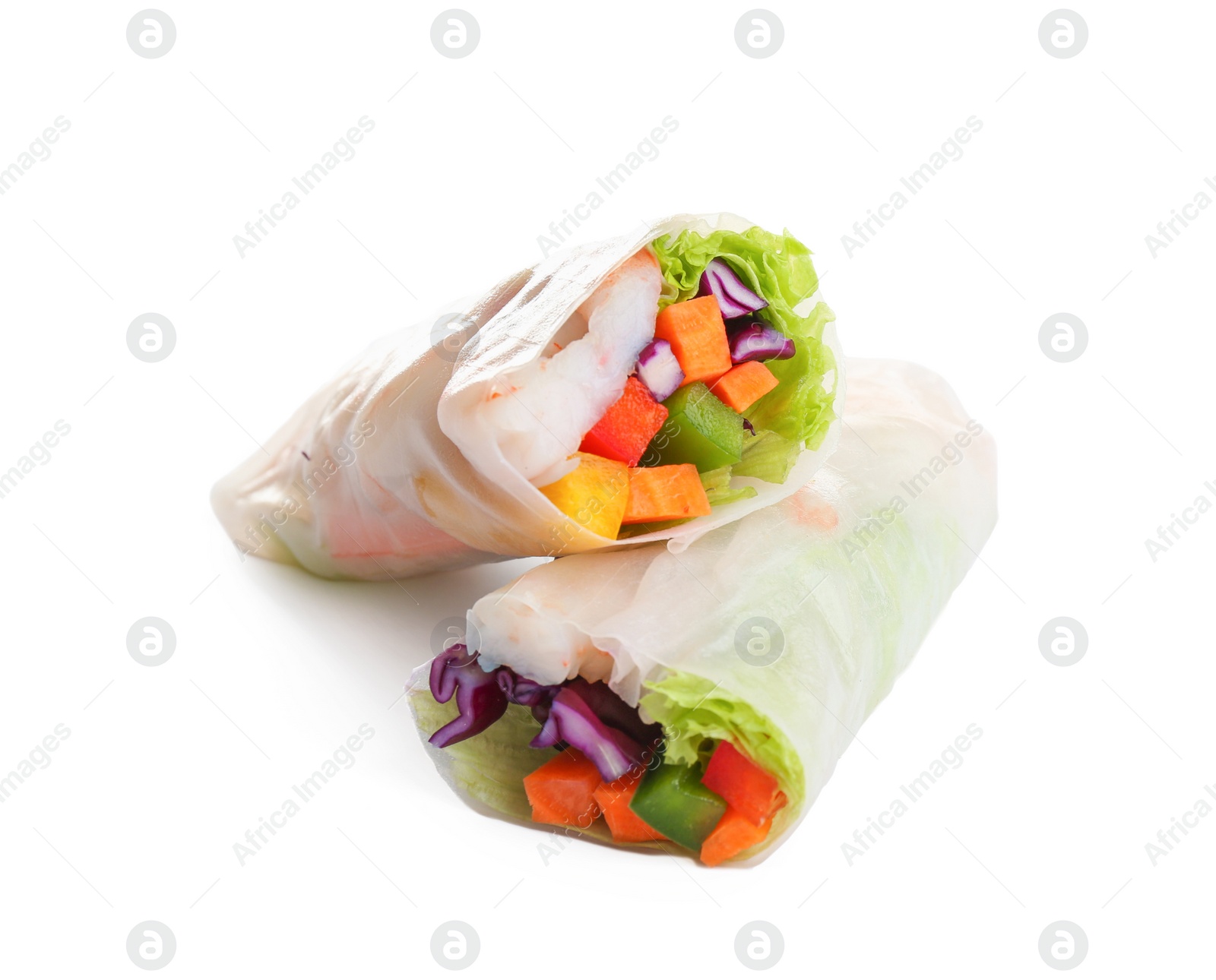 Photo of Delicious rolls wrapped in rice paper isolated on white