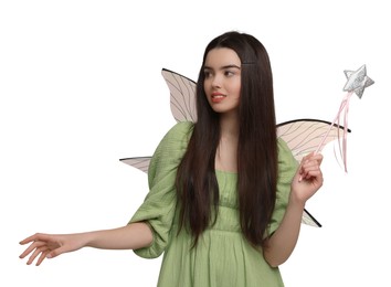 Beautiful girl in fairy costume with wings and magic wand on white background