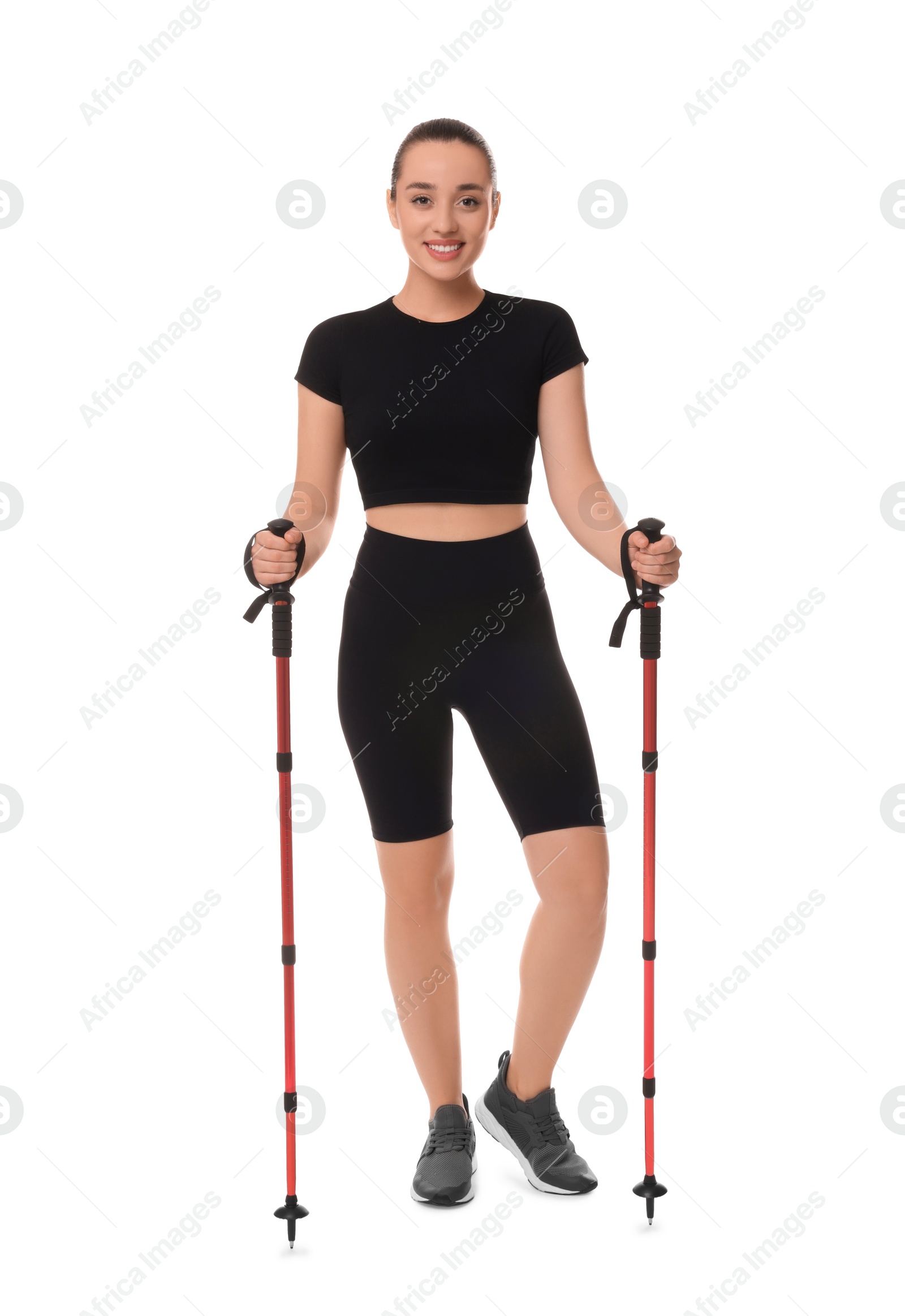 Photo of Woman with poles for Nordic walking isolated on white