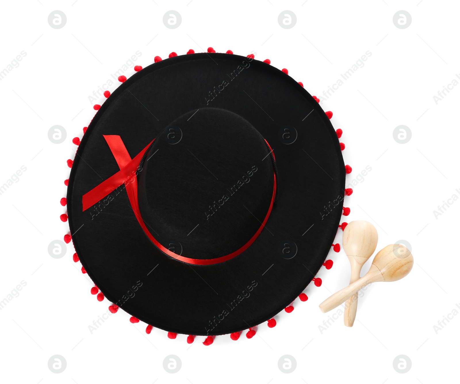 Photo of Mexican sombrero hat and maracas isolated on white, top view