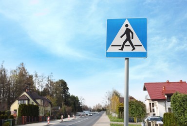 Photo of Traffic sign Pedestrian Crossing on city street, space for text