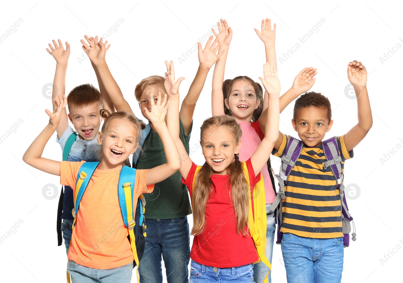 Photo of Group of little school children with backpacks on white background