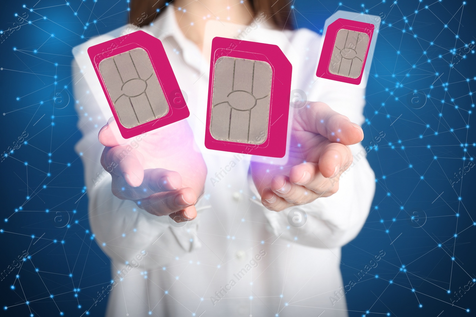 Image of Woman demonstrating SIM cards of different sizes on color background, closeup 