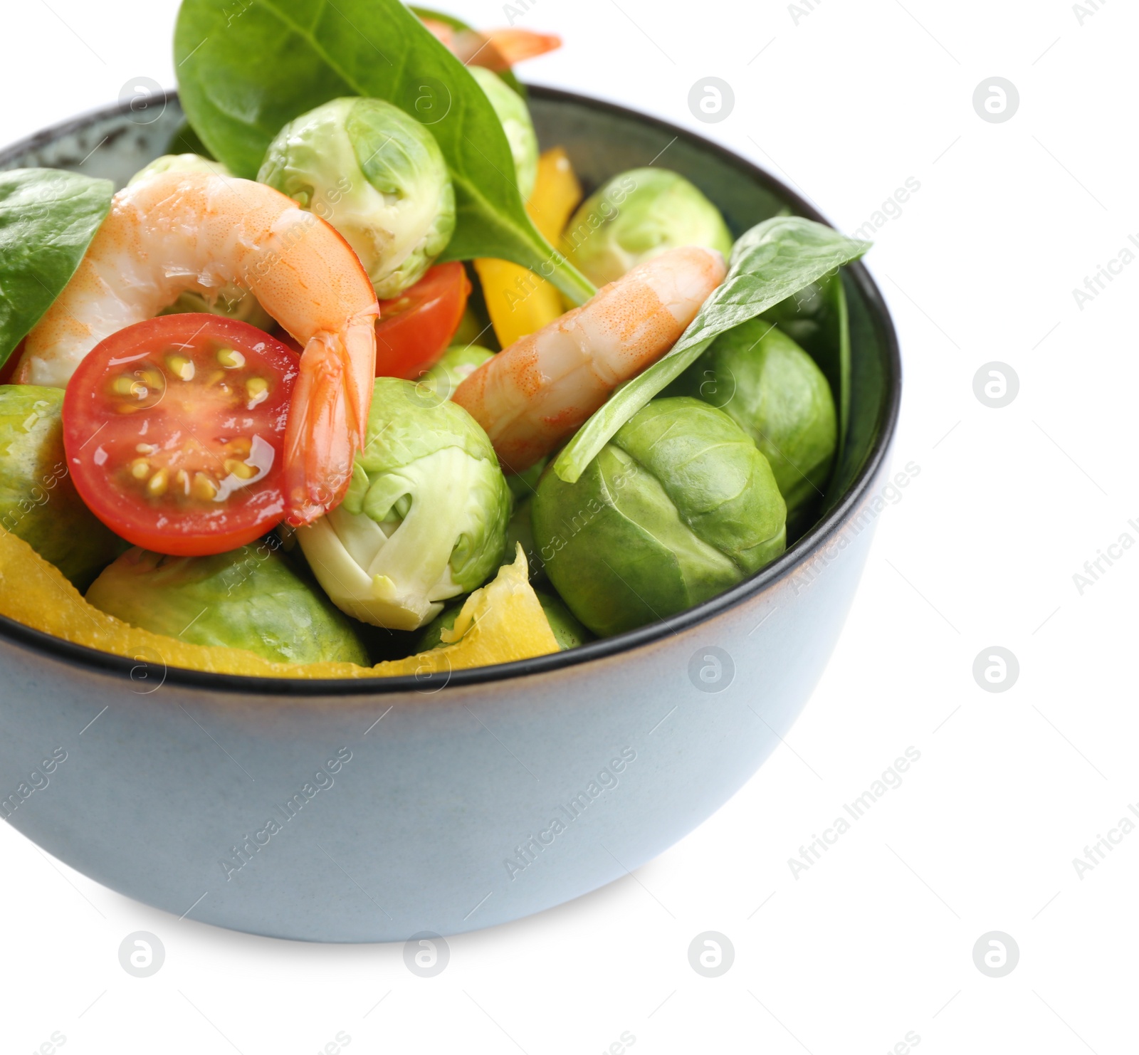 Photo of Tasty salad with Brussels sprouts in bowl isolated on white, closeup