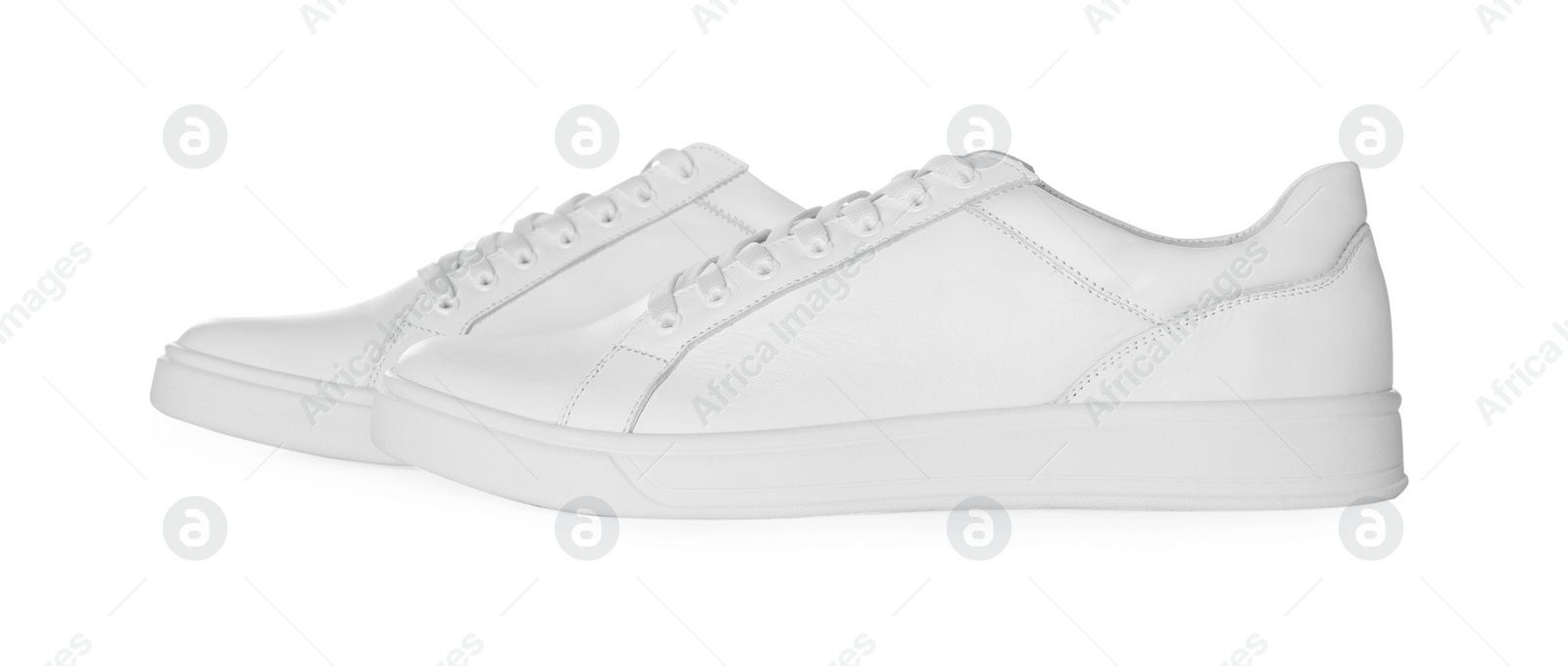 Photo of Pair of stylish sneakers isolated on white