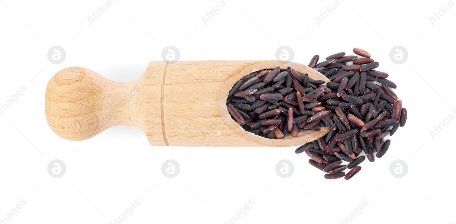 Photo of Scoop with raw black rice isolated on white, top view