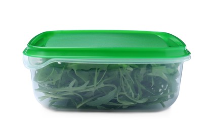 Photo of Fresh arugula in plastic container isolated on white