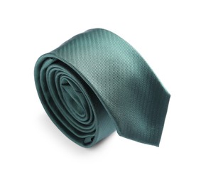 Photo of One rolled green necktie isolated on white