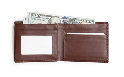 Stylish brown leather wallet with dollar banknotes on white background, top view