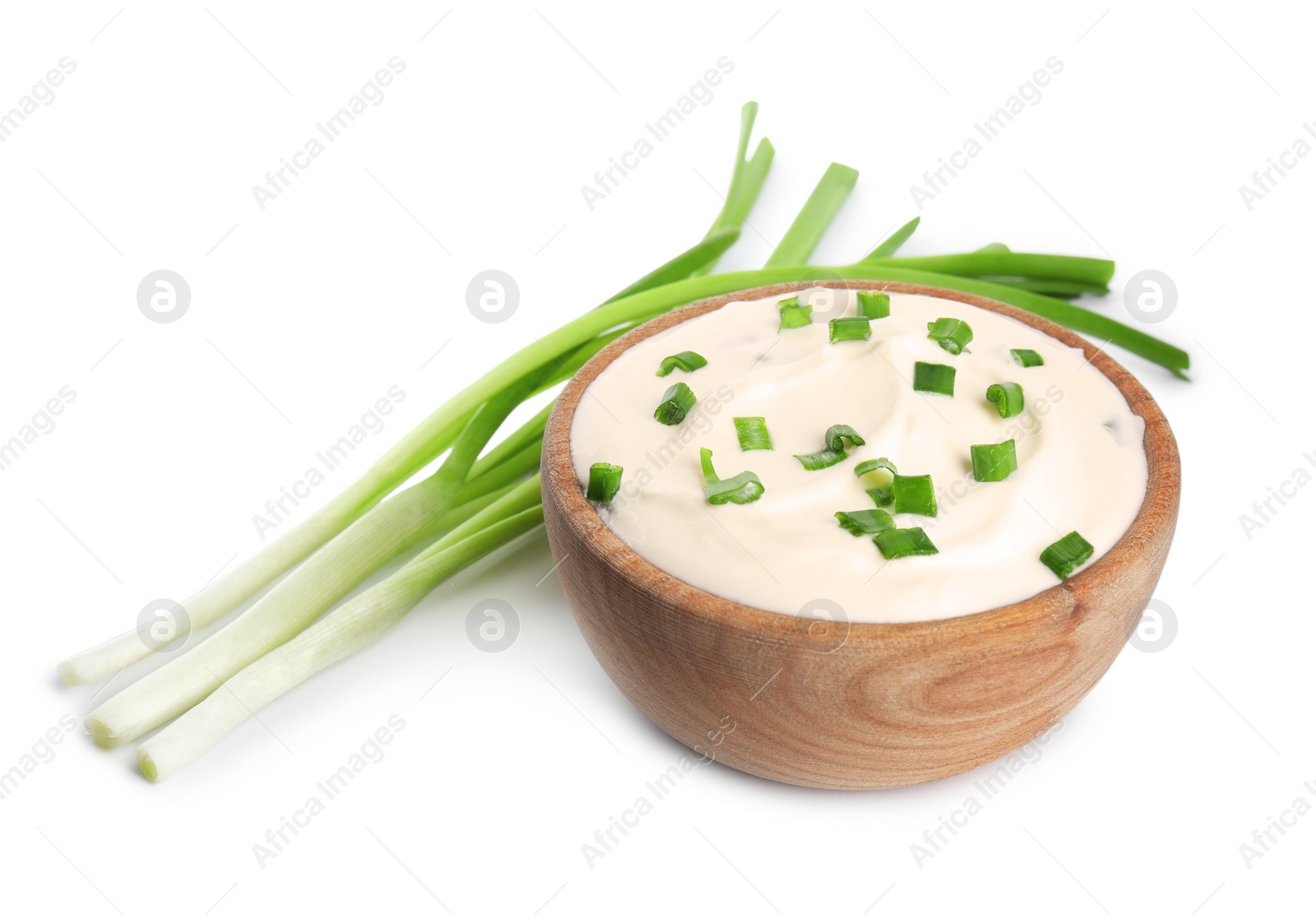 Photo of Fresh sour cream with onion on white background