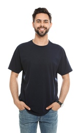 Photo of Young man in t-shirt on white background. Mock up for design