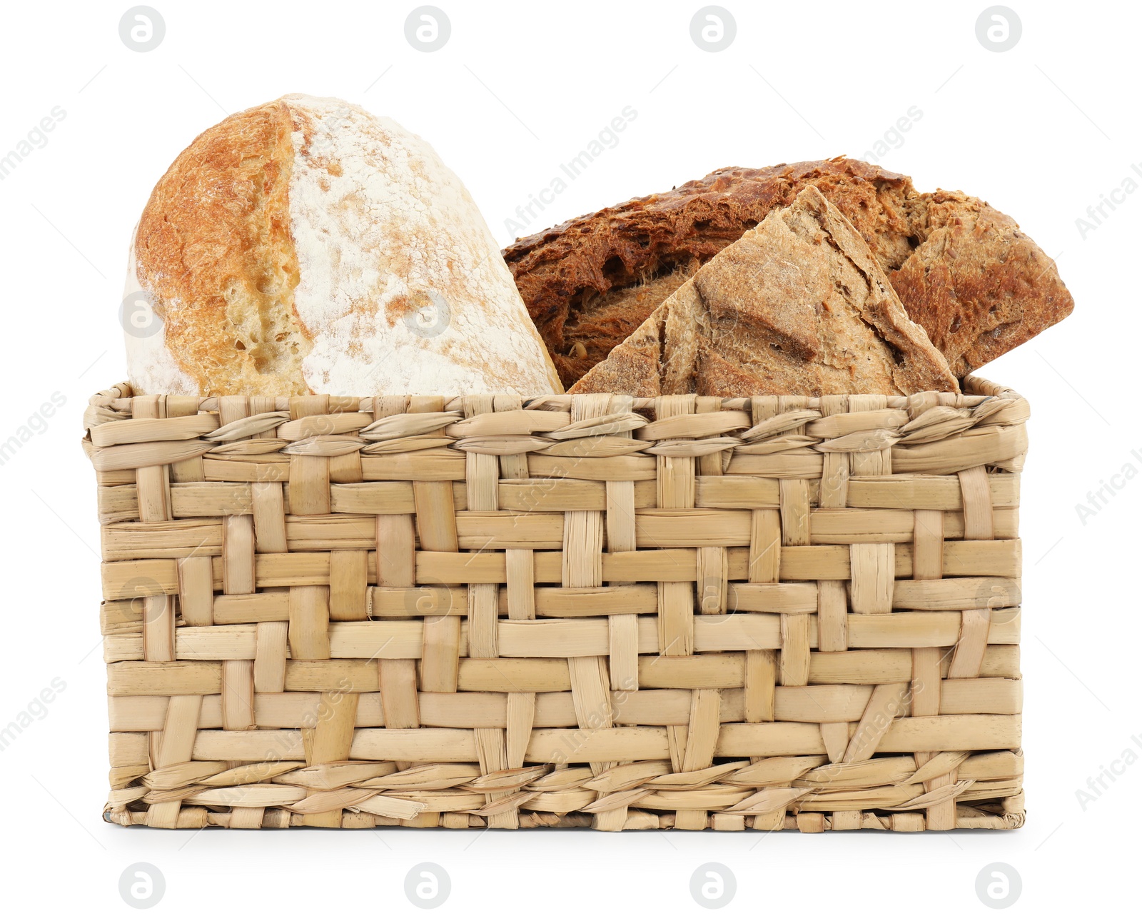 Photo of Basket with different types of fresh bread isolated on white