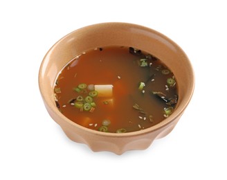 Photo of Bowl of delicious miso soup with tofu isolated on white