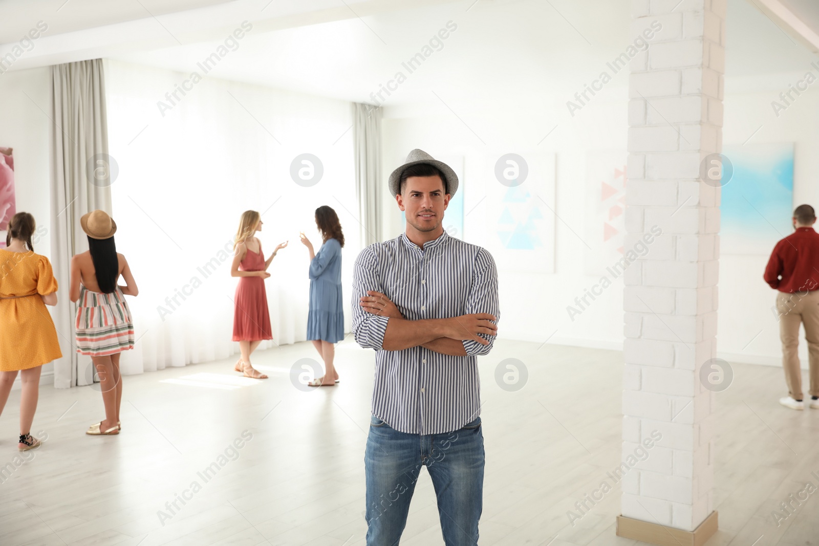 Photo of Thoughtful man at exhibition in art gallery