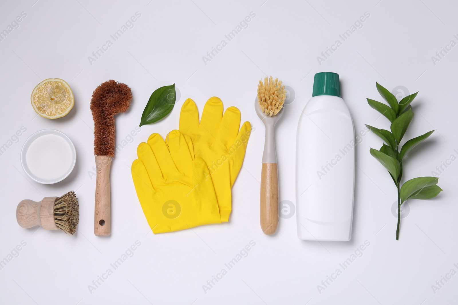 Photo of Flat lay composition with different cleaning supplies on white background