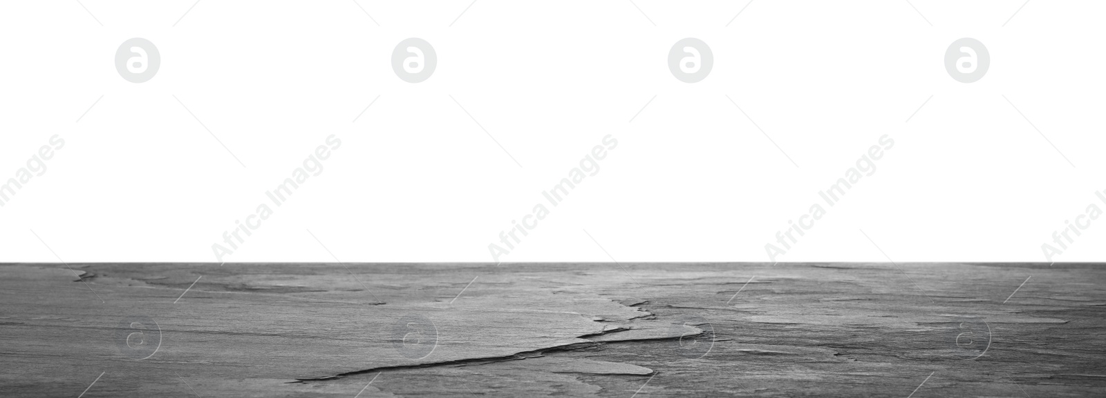 Photo of Empty black stone surface isolated on white. Mockup for design