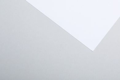 Photo of Colorful paper sheets as background, top view