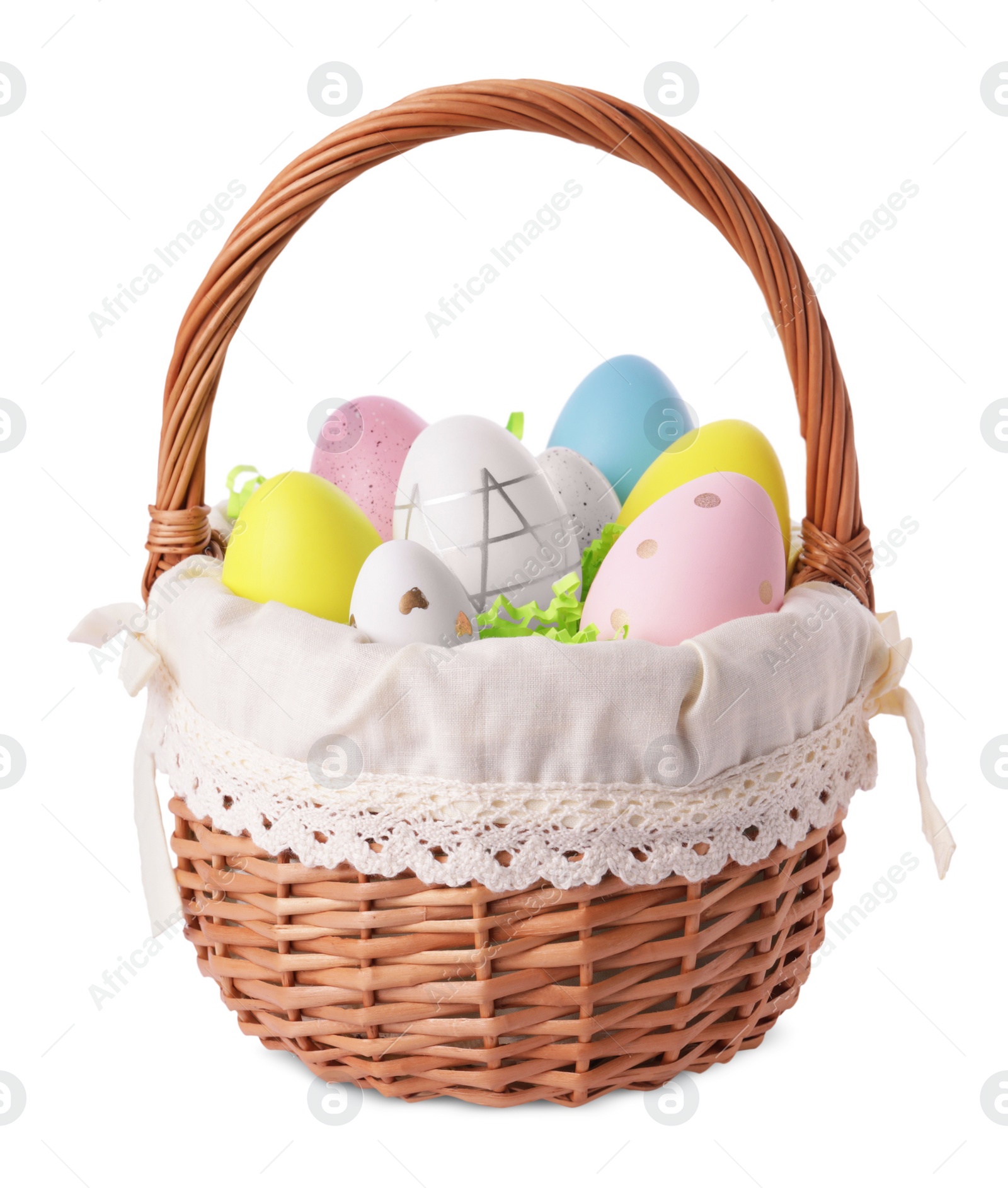 Photo of Wicker basket with beautifully painted Easter eggs isolated on white