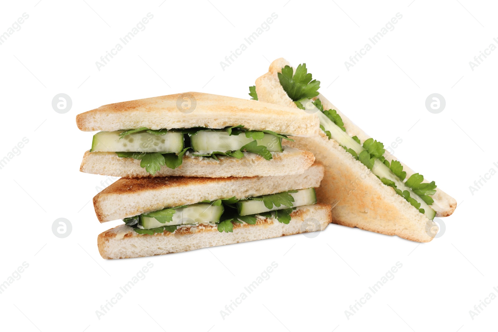 Photo of Tasty sandwiches with cucumber and parsley on white background