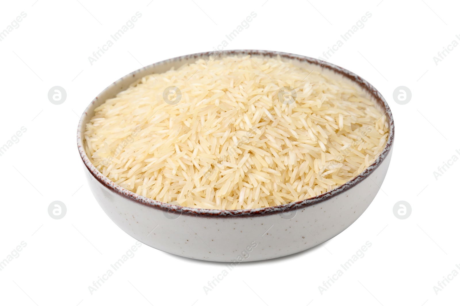 Photo of Raw rice in bowl isolated on white