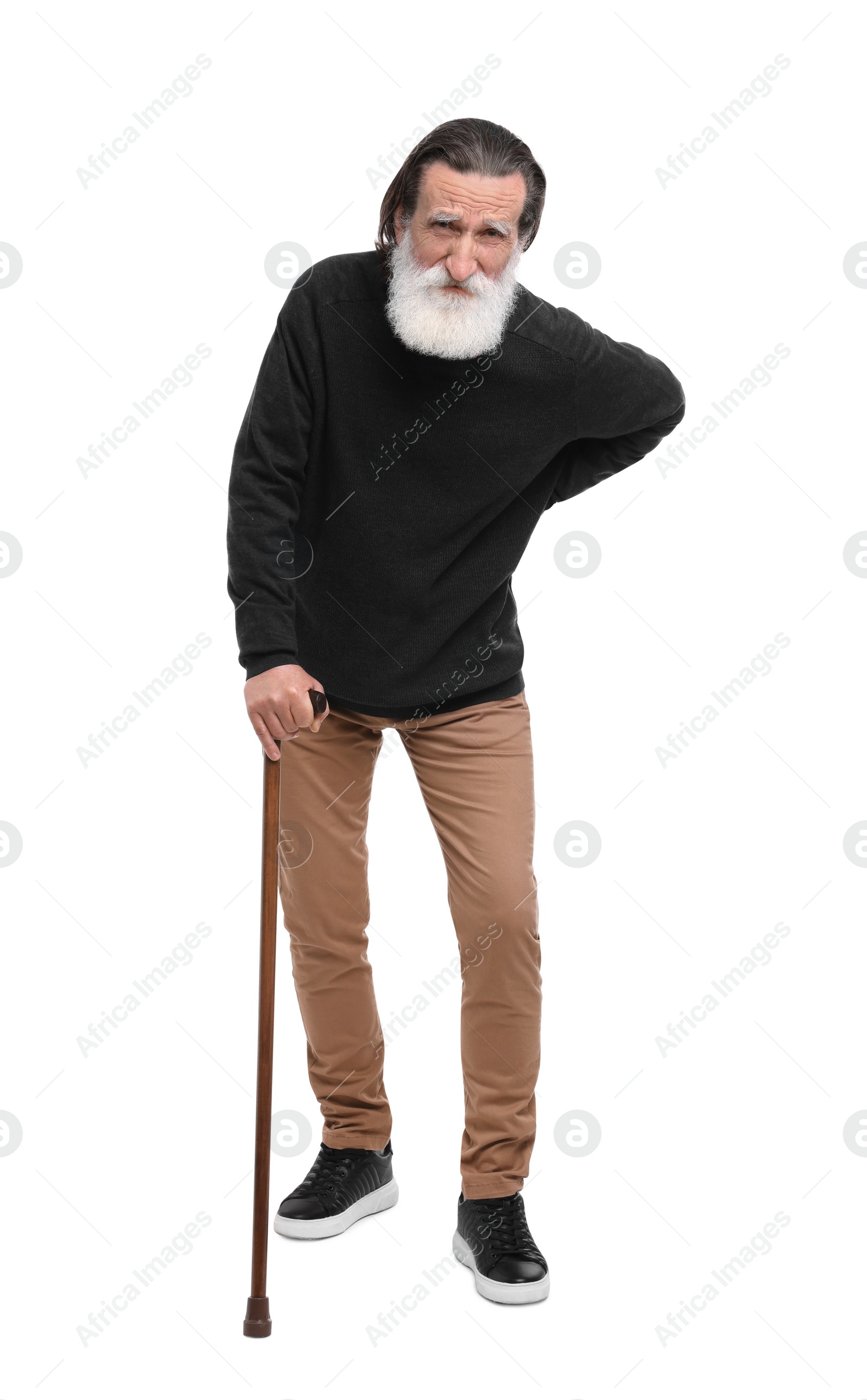 Photo of Senior man with walking cane suffering from back pain on white background