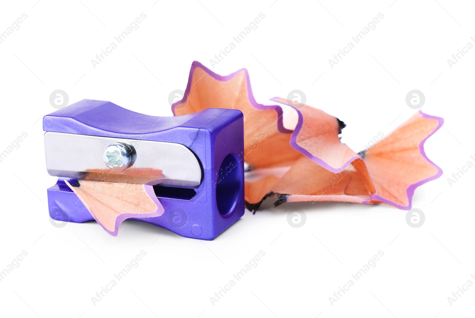 Photo of Violet sharpener with pencil shavings on white background