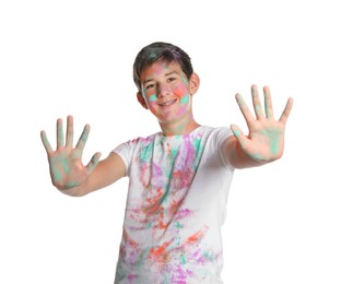 Photo of Teenage boy covered with colorful powder dyes on white background. Holi festival celebration