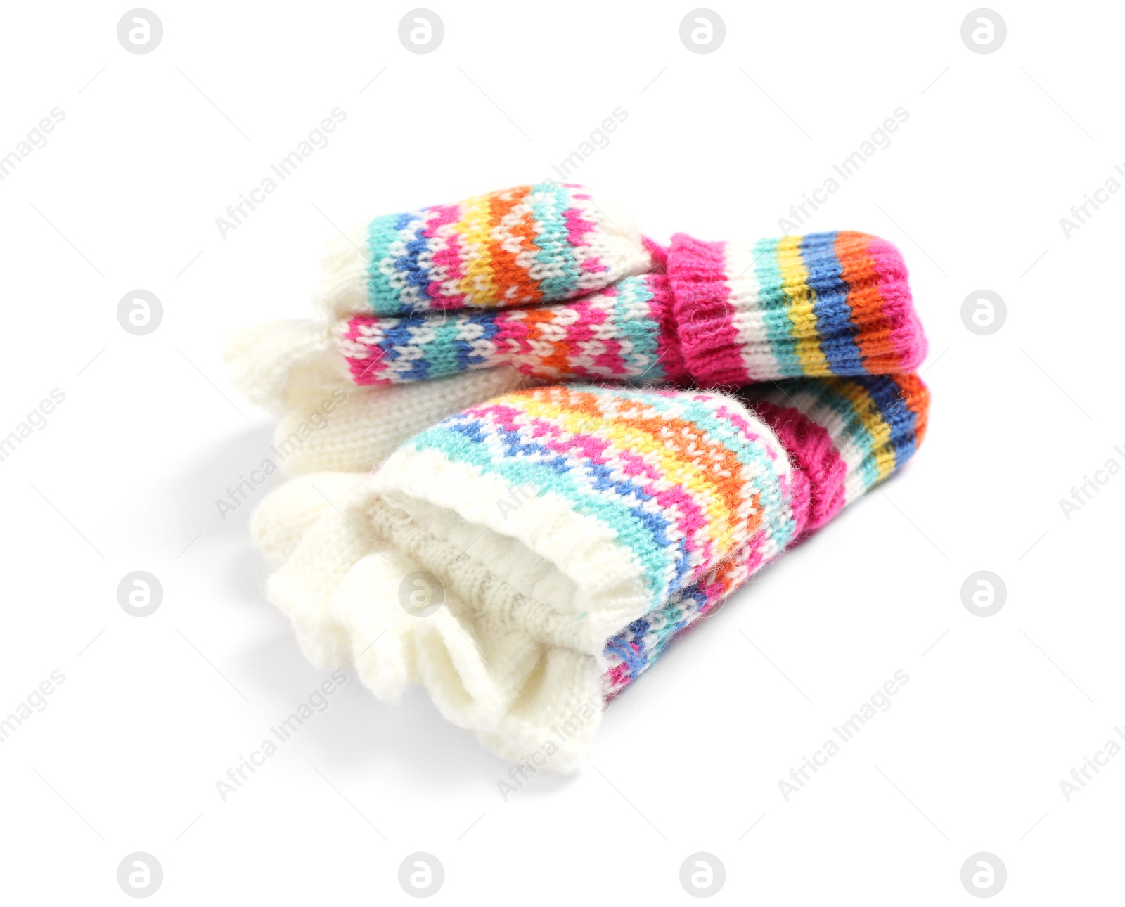 Photo of Warm knitted kid's mittens on white background