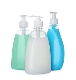 Dispensers of liquid soap on white background