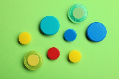 Photo of Bright magnets on color background, top view
