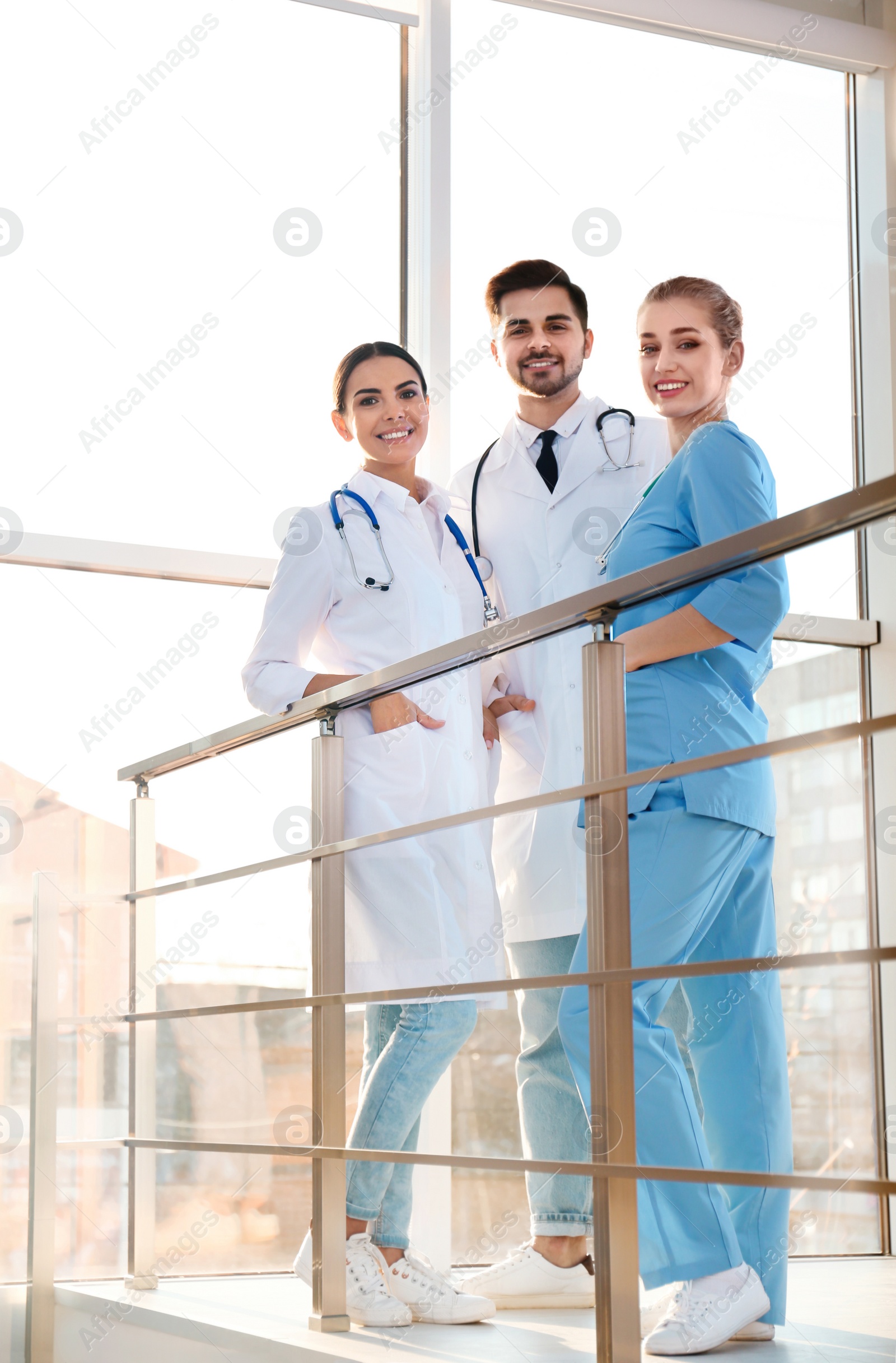 Photo of Group of medical doctors indoors. Unity concept