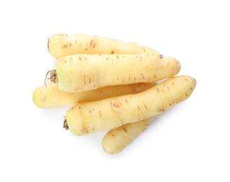 Whole fresh raw carrots isolated on white, top view