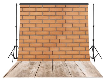 Image of Photo background with brick wall and wooden floor. Professional studio equipment