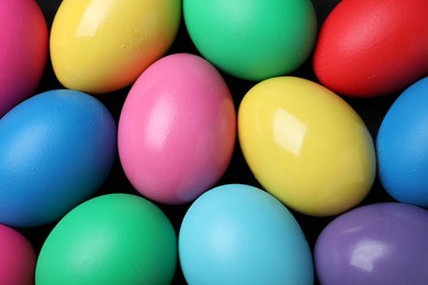 Colorful eggs as background, closeup. Happy Easter
