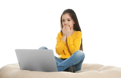 Little girl using video chat on laptop against white background