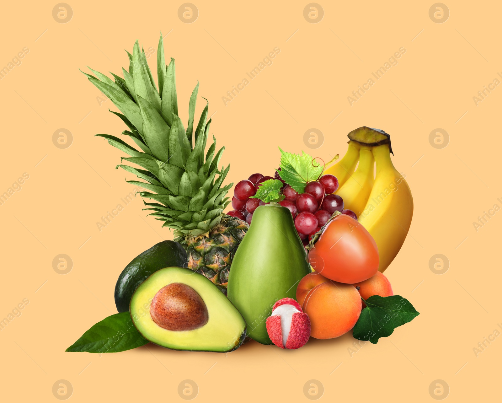 Image of Many different fresh fruits on pale orange background