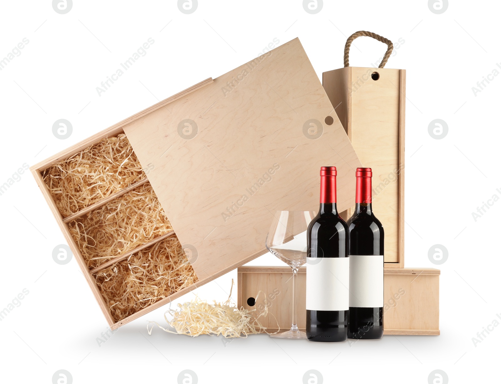 Photo of Wooden gift boxes with wine and glass isolated on white